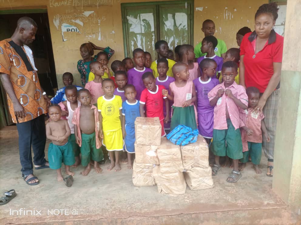 Donation of Notebooks for pupils of Eguare Primary School, Ugbegun